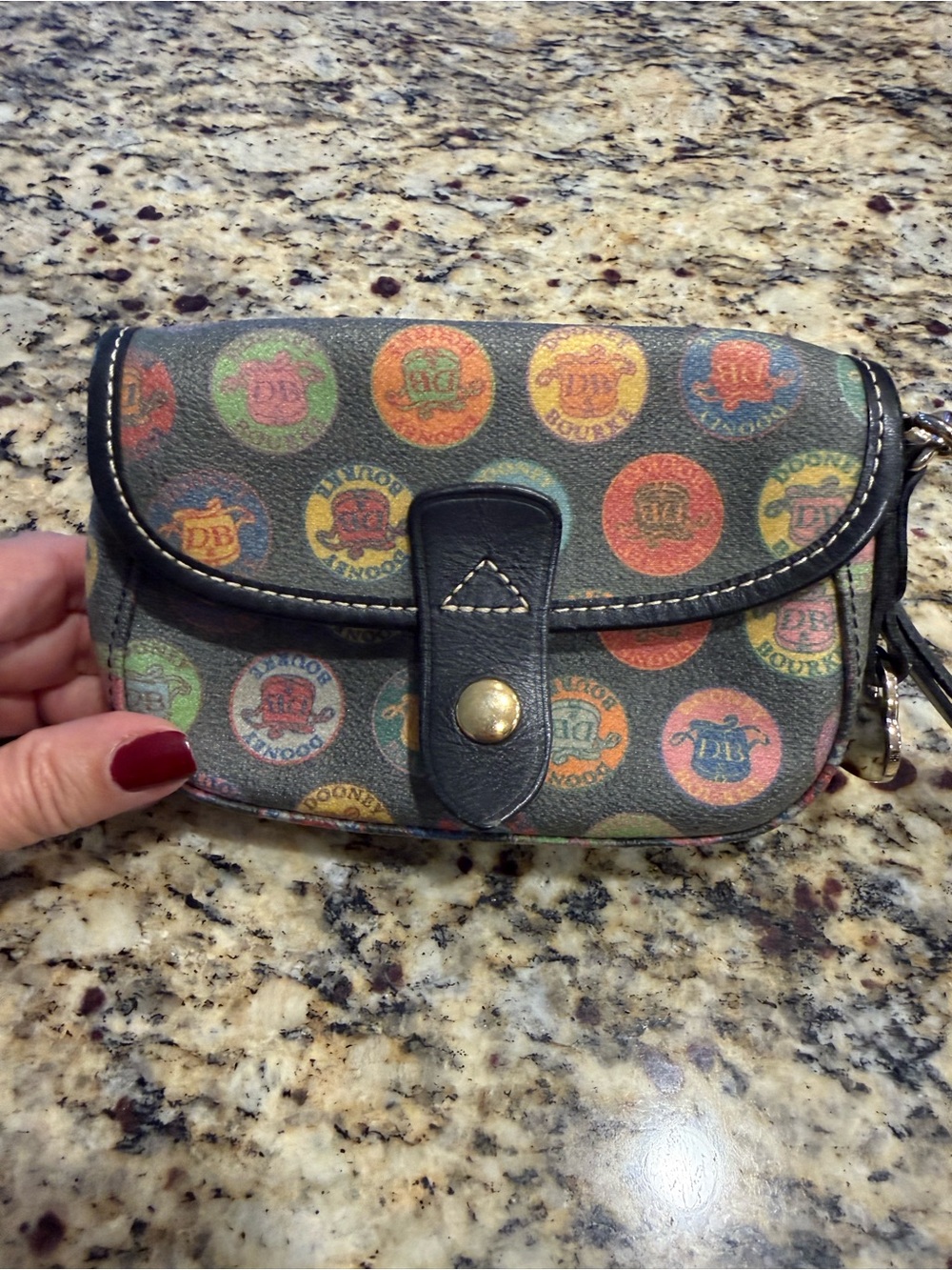 2 coin purses - Dooney & Bourke Multicolor Logo Circle Wristlet with Black Trim